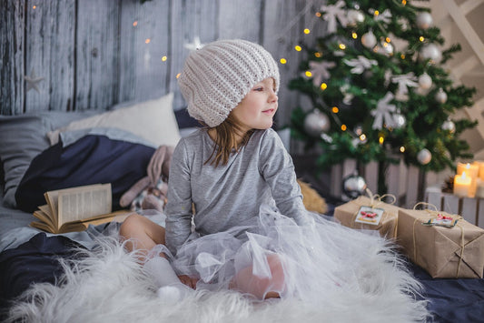 Ein Weihnachtsgeschenk, das Kinderaugen  strahlen lässt: Personalisierte Kinderbilder auf Leinwand